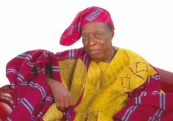 Yoruba elder teaching children